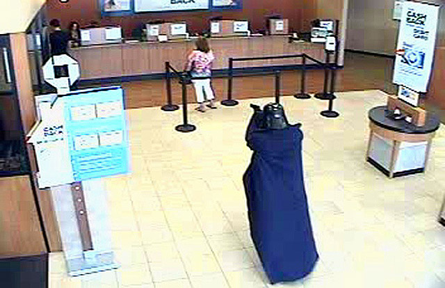 Does Darth Vader breathe heavier while robbing a bank than Mel Gibson does while making a phone call?
