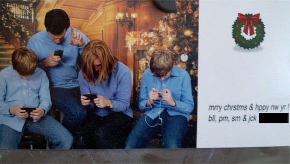 The perfect family Christmas card to send when you love your iPhone more than your family.