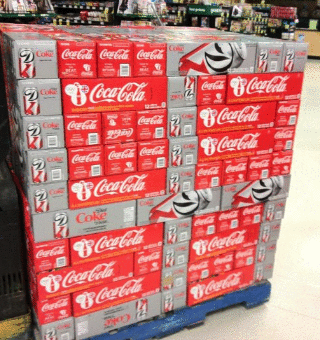 Supermarket accidentally commits hate crime with soda display.