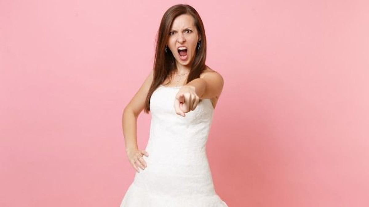 Groom has 'more fun' with female BFF than bride on wedding day, bride blames his BFF.