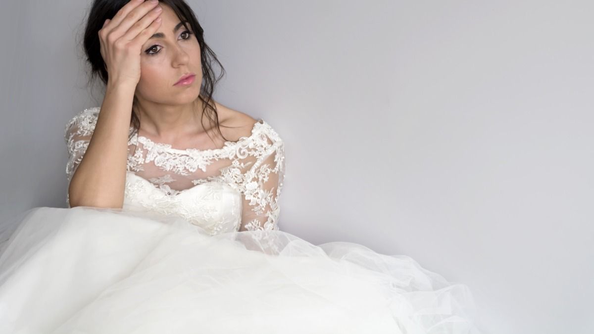 Bride excludes MIL from wedding after she pressures her to wear dead SIL's dress. AITA?