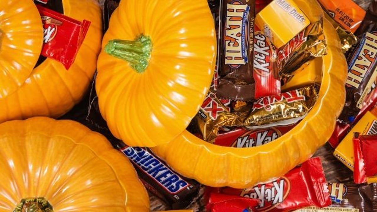 People respond to Dad's post criticizing parents who hand out "cheap candy" on Halloween.
