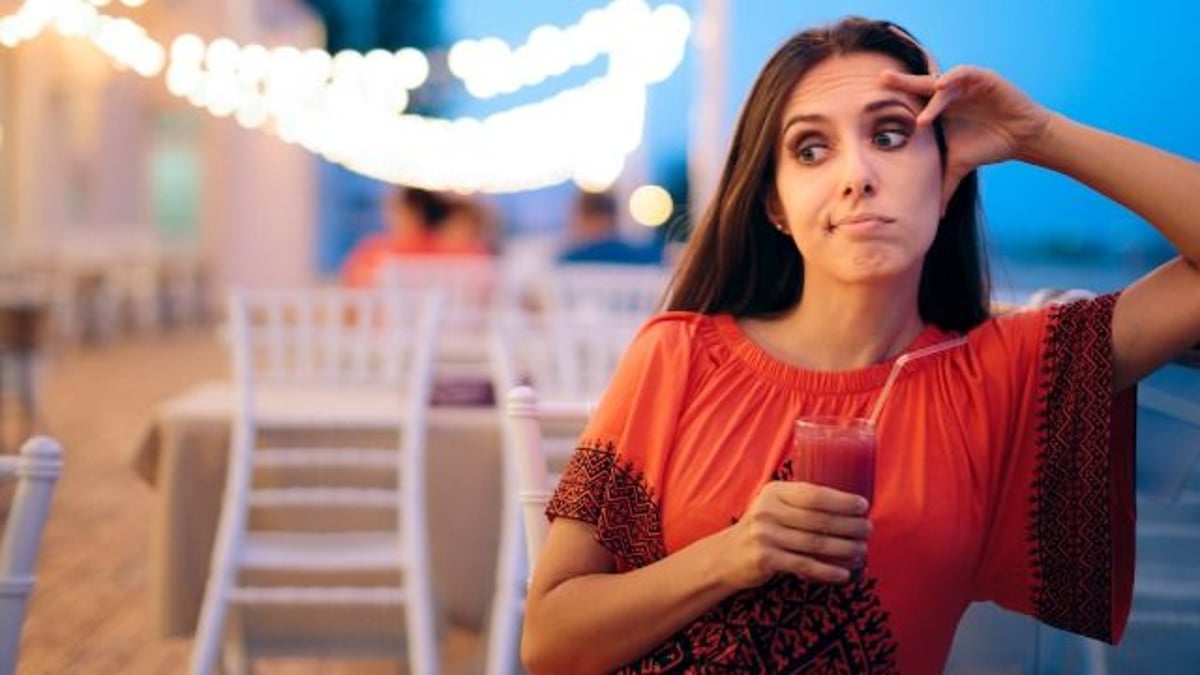 Couple divides wedding guests; stamps their hands; serve them different dinners.