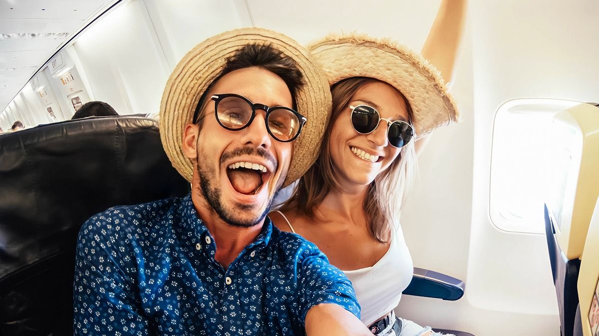 Plane passenger reports couple who 'snuck' into premium seats; 'I paid for extra room.'