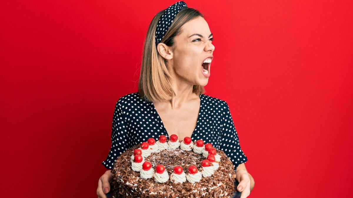 Woman leaves stepdaughter's bday after hubby throws out the cake she made for her. AITA?