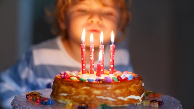 Adult daughter 'goes ballistic' when 5yo cousin blows out her birthday candles.