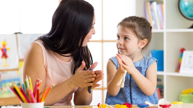 Dad wants to confront pre-school teacher about not being 'nice' enough. Wife disagrees.