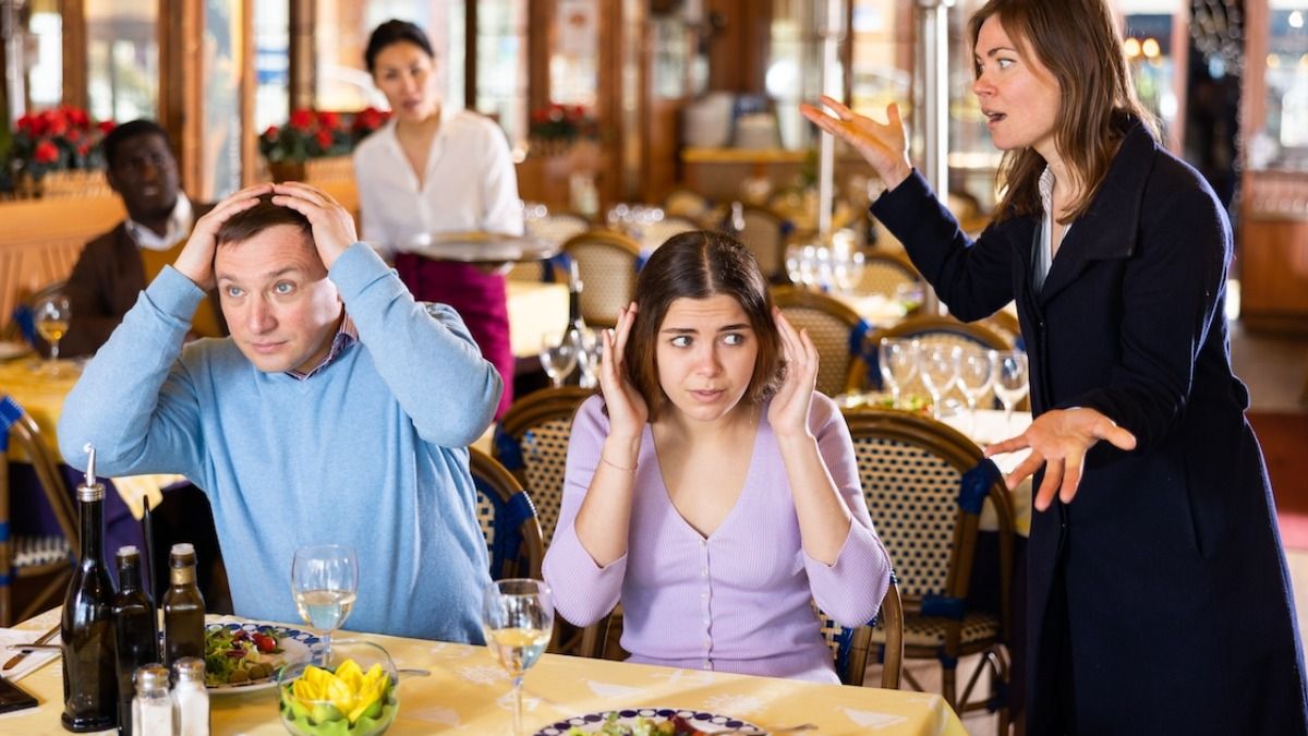 'AITA for not changing a table in a restaurant because of a stranger's allergy?'