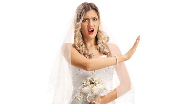 Bride bans non-married couples in 'no ring no bring' rule, insulting close friends.