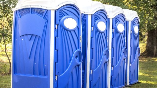 Bride refuses to provide 'special porta-potty' for mom's BF at wedding. AITA?