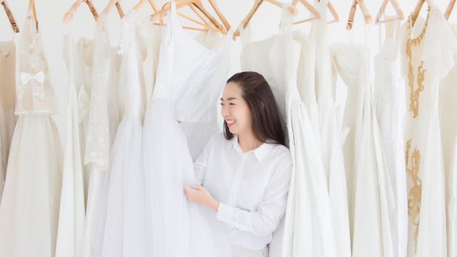 Bride asks if she's wrong for refusing to take mom wedding shopping because of a grudge.