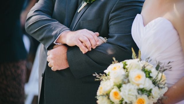Bride asks if she's wrong for refusing to let stepdad give her away at wedding.