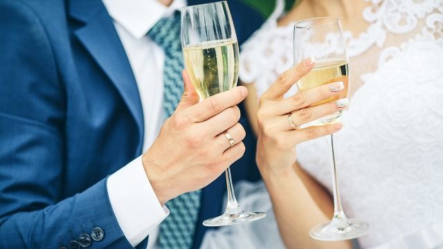 Couple having alcohol-free wedding spark debate about social drinking vs. alcoholism.