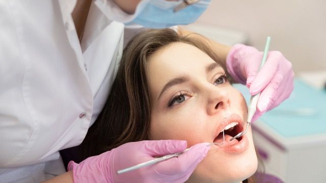 Woman confronts dentist during cleaning, 'this radio station makes me uncomfortable.'