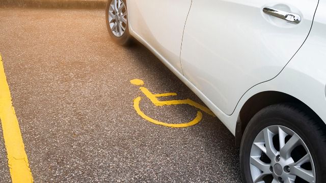 Woman gets called out for using expectant mother's parking with disabled permit.