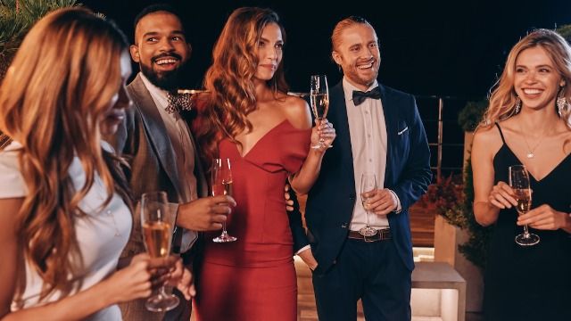 Guest roasts $500 'Black Tie' NYE wedding with cash bar, 'I expect a free beer.'