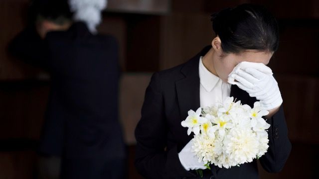 Woman refuses to wear skirt to sister's 'traditional' funeral, family is taking sides.