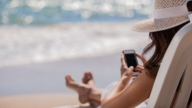 Mom wants 'me time' with phone on vacation, husband accuses her of 'missing firsts.'
