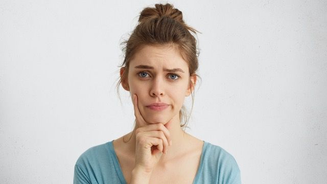 Woman tells friend that her open relationship is 'making her look dumb.'