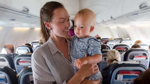 Dad asks if he was wrong to yell at plane passenger who told his baby to 'shut up.'