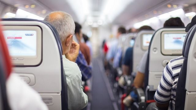Guy shares wild story of sitting next to plane passenger who gets drunk and crazy.