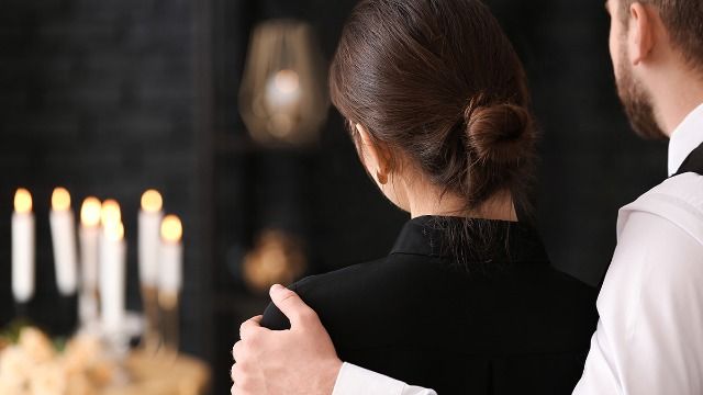 Woman crashes ex MIL's funeral; tells his kids she's pregnant with their sibling.