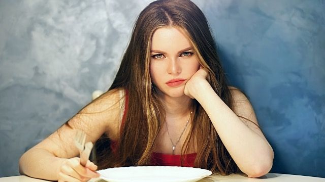 Woman threatens to skip Thanksgiving if mom makes her brother-in-law a birthday cake.