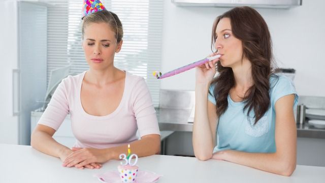 Woman walks when family secretly invites 'bully' cousin to birthday dinner. AITA?