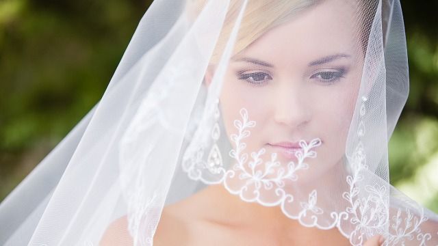 Woman asks if she's wrong to not let half-sister wear her mom's veil for wedding.