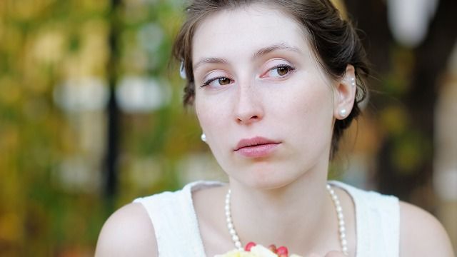 Woman's daughter is only one excluded from 'child-free' wedding; suspects ableism.