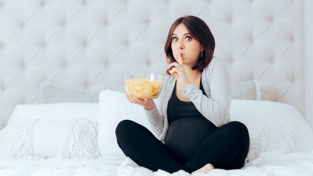 Pregnant woman decides to start hiding 'weird' eating habits from 'spying' in-laws.