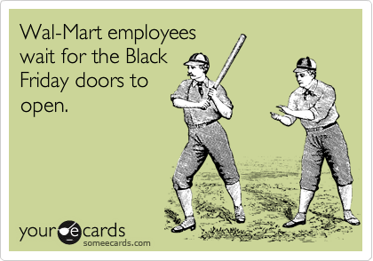 Wal-Mart employees
wait for the Black
Friday doors to
open.